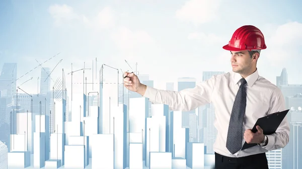 Businessman drawing skyscrapers — Stock Photo, Image
