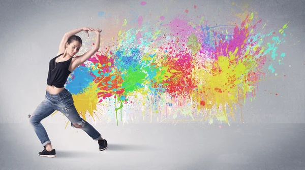 Young colorful street dancer with paint splash — Stock Photo, Image