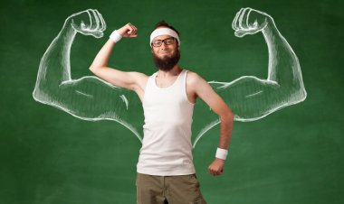 Sıska genç adam çalışıyor.