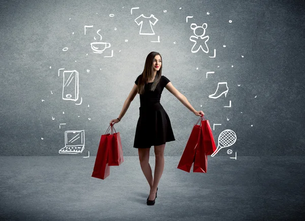 Mujer de compras con bolsos e iconos dibujados —  Fotos de Stock