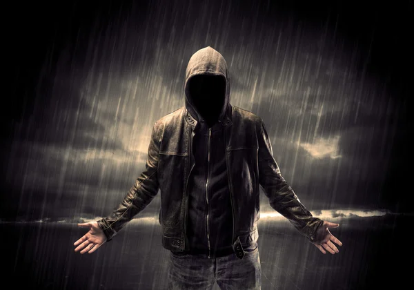 Anonymous terrorist in hoodie at night — Stock Photo, Image