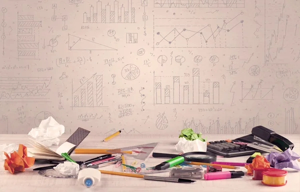 Graph charts and designer office desk — Stock Photo, Image