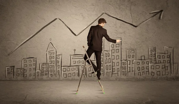 Man drawing line above the city — Stock Photo, Image