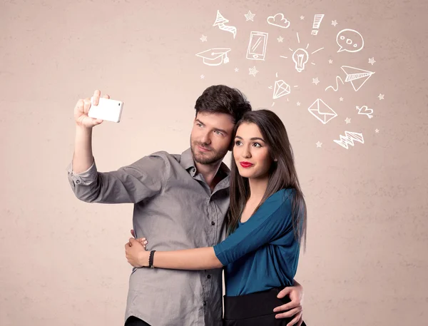 Couple taking selfie with thoughts illustrated — Stock Photo, Image