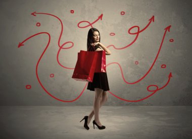 Şık kadın alışverişi ve kırmızı oklar