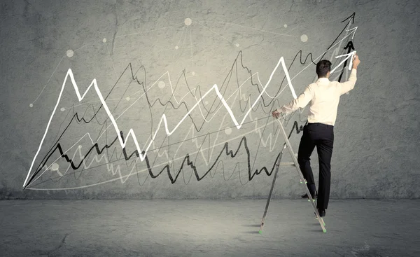 Man on ladder drawing lines — Stock Photo, Image