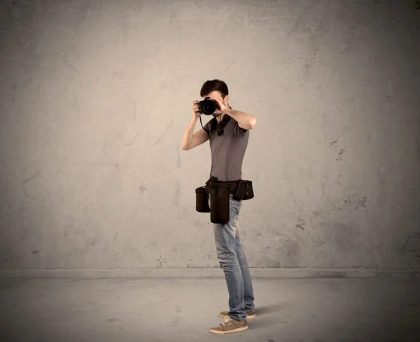 Hobby photographer holding camera — Stock Photo, Image