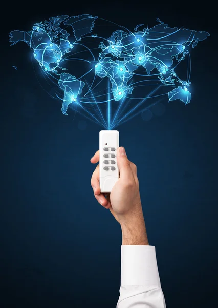 Hand with remote control, social media concept — Stock Photo, Image