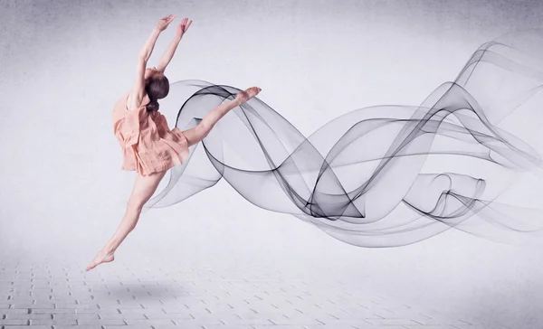 Modern ballet dancer performing with abstract swirl — Stock Photo, Image