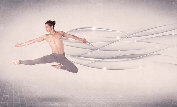 Танцівниця балету виконує сучасний танець з абстрактними лініями — стокове фото