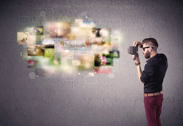 Young malewith beard taking vintage photos — Stock Photo, Image