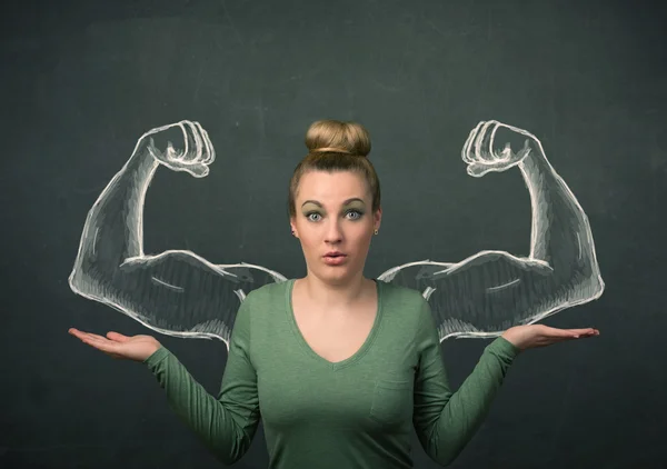 Woman with sketched strong and muscled arms — Stock Photo, Image