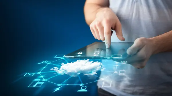 Close up of hand holding tablet with cloud network technology — Stock Photo, Image