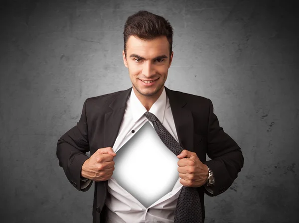 Businessman tearing off his shirt with white copyspace on chest — Stock Photo, Image