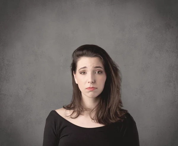 Mädchen mit lustigem Gesichtsausdruck — Stockfoto