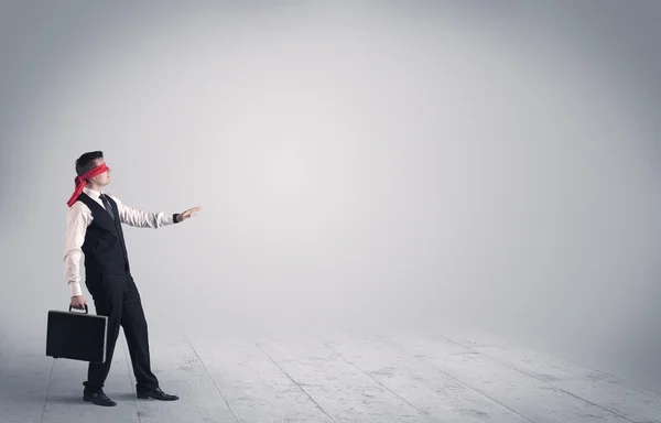 Businessman with blindfolds — Stock Photo, Image