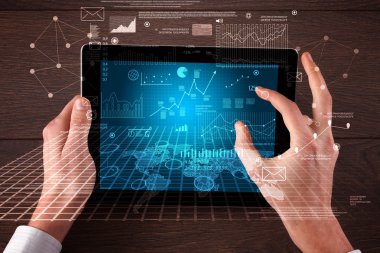 Tablet tutan eller iş