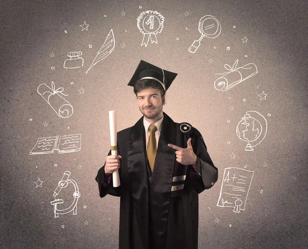 Happy graduate teenager with hand drawn school icons — Stock Photo, Image