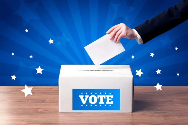 Hand with ballot and wooden box — Stock Photo, Image