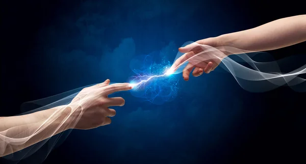 Hands connecting through fingers in space — Stock Photo, Image