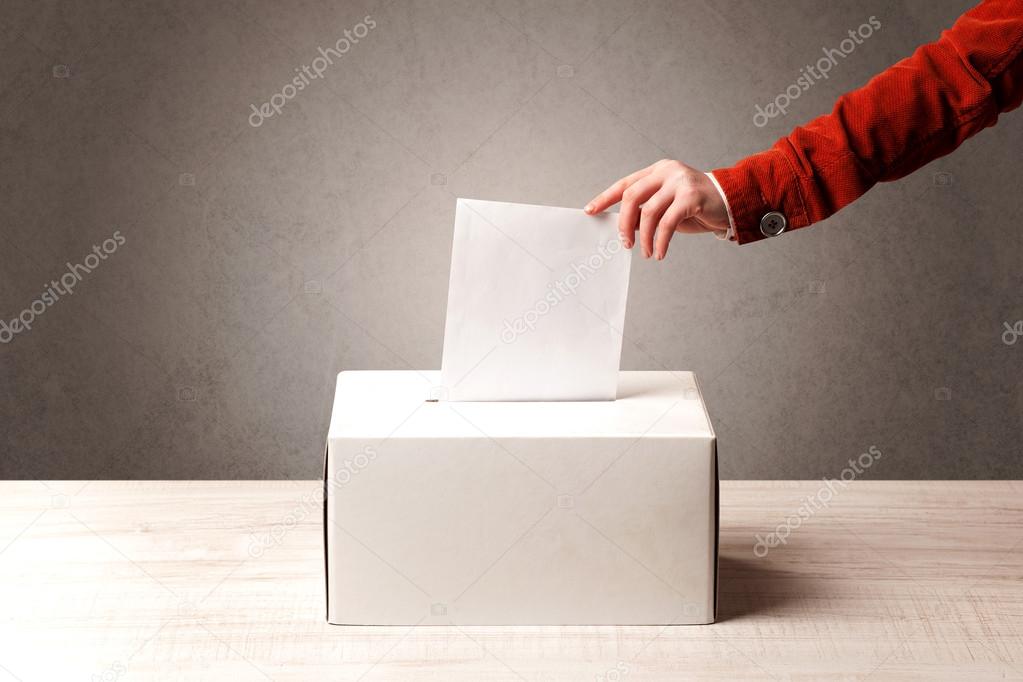 Ballot box with person casting vote 