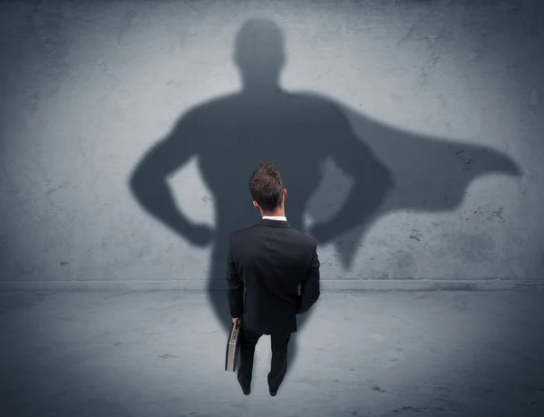Empresário bem sucedido com sombra de super-herói — Fotografia de Stock