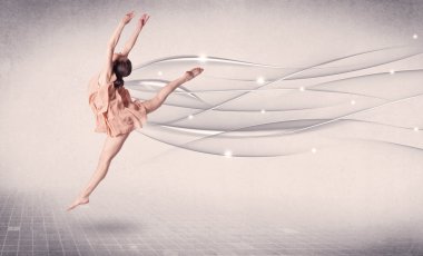 Bale dansçısı soyut çizgilerle modern dans gösterisi yapıyor. 