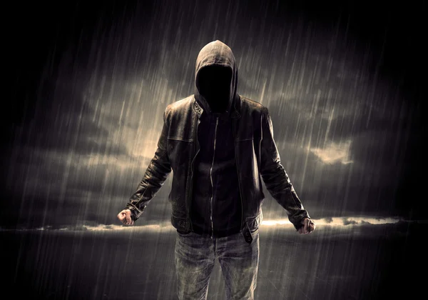 Anonymous terrorist in hoodie at night — Stock Photo, Image