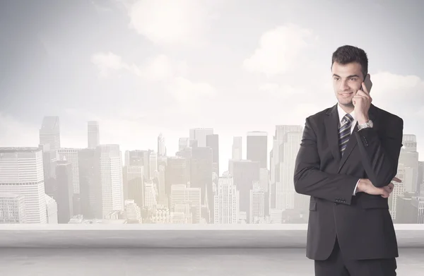 Sales person talking in front of city scape Stock Image