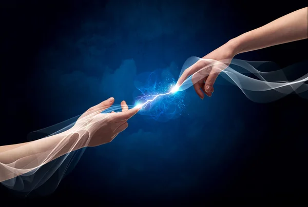 Hands connecting through fingers in space — Stock Photo, Image