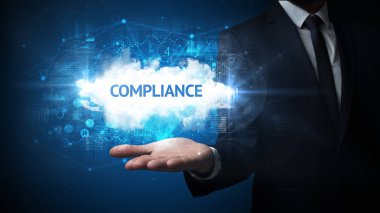 Motivasyon mesajı taşıyan iş adamının eli