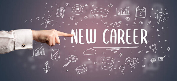 Close-Up of cropped hand pointing at business inscription