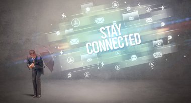 Şemsiyeyle savunma yapan iş adamı