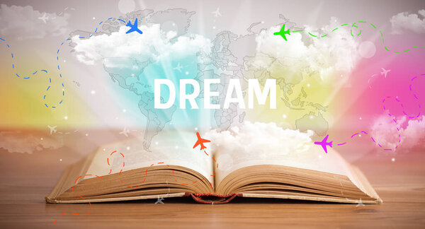 Open book with DREAM inscription, vacation concept
