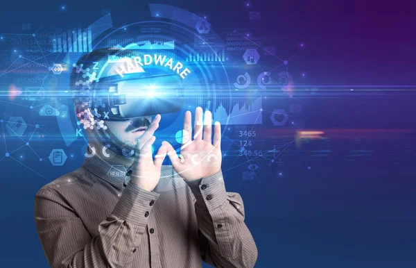 Businessman looking through VR glasses — Stock Photo, Image