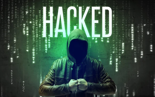 Gezichtloze hacker met inscriptie — Stockfoto