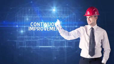 Miğferli yakışıklı mimar.