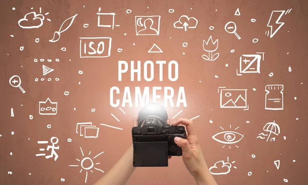 Hand taking picture with digital camera — Stock Photo, Image