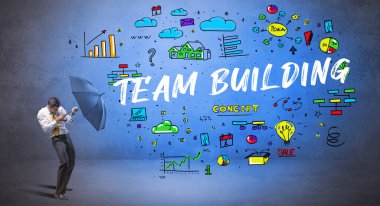 Şemsiyenin arkasına saklanan iş adamı