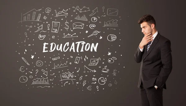 Businessman thinking with educational inscription — Stock Photo, Image