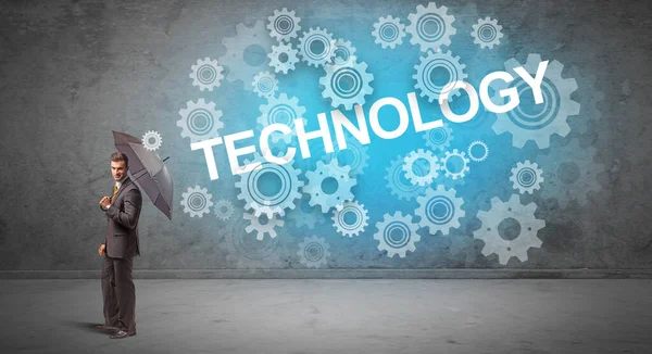 Şemsiyeyle savunma yapan iş adamı