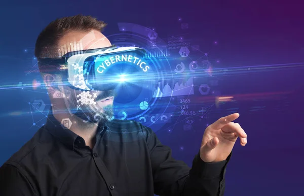 Businessman looking through VR glasses — Stock Photo, Image