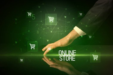 Alışveriş arabası simgeleriyle çevrimiçi alışveriş kavramı