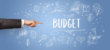 İşletme yazıtlarına işaret eden kırpılmış elin yakın çekimi