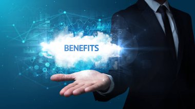 Motivasyon mesajı taşıyan iş adamının eli