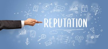 İşletme yazıtlarına işaret eden kırpılmış elin yakın çekimi