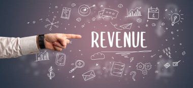 İşletme yazıtlarına işaret eden kırpılmış elin yakın çekimi