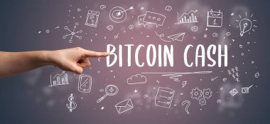 İşletme yazıtlarına işaret eden kırpılmış elin yakın çekimi