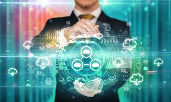 Businessman holding technology icon concept — Stock Photo, Image