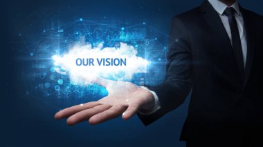 Motivasyon mesajı taşıyan iş adamının eli